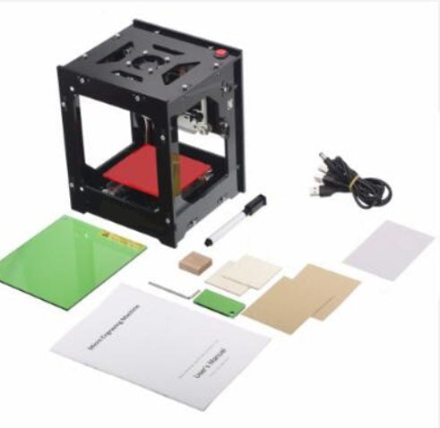 NEJE laser engraver kit with components on a white background
