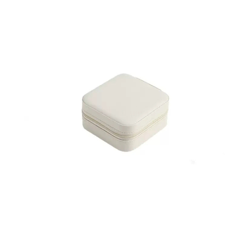 TrinketNest travel jewelry case in White, closed zippered case