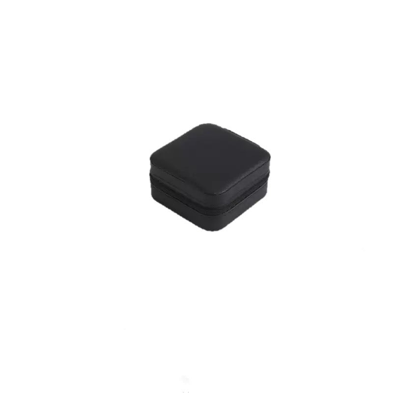 TrinketNest travel jewelry case in Black, closed with zipper